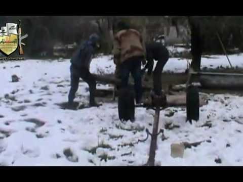 تقرير مرئي عن استهداف كتيبة سيف الإسلام بقذائف الهاون حواجز قوات النظام على المتحلق الجنوبي قرب بلدة زملكا في ريف دمشق