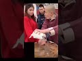 Black Chinese demonstrating insane sharp knife.