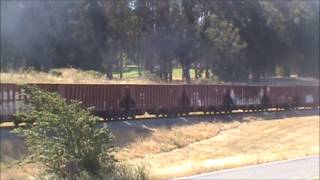 preview picture of video 'BNSF Dash 9s Lead a Work Train through Pinole with a Caboose on the End (6/27/12)'