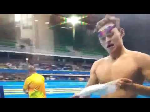 Olympic Gold Medalist Sun Yang TRIES to throw his swimming cap to the crowd