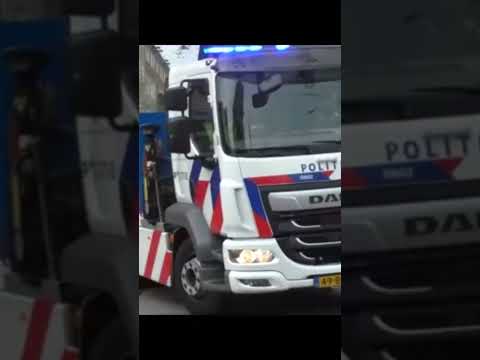Politie Amsterdam takelwagen met spoed naar een onbekend melding in Amsterdam