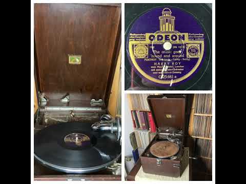 Harry Roy vom Mayfair Hotel, London, mit seinem Tanz-Orchester:The Music goes round and around, 1936