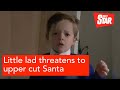 Little lad threatens to upper cut Santa
