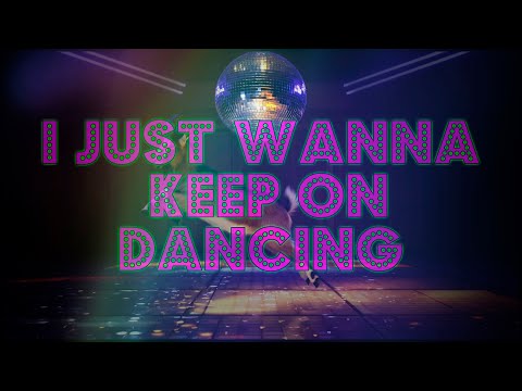 Video thumbnail with the title "I Just Wanna Keep on Dancing" in glowing pink and purple lettering over a dark, disco-ball-lit scene.