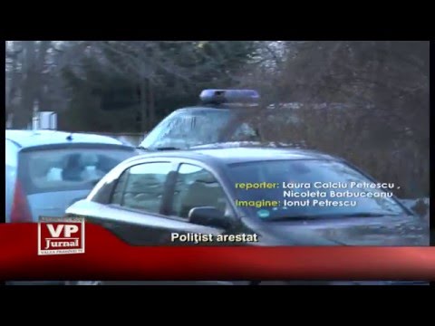 Politist arestat