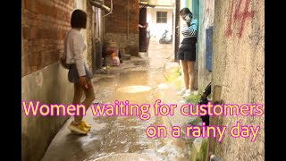 Exploring China's slums on a rainy day, many women are soliciting customers in the rain