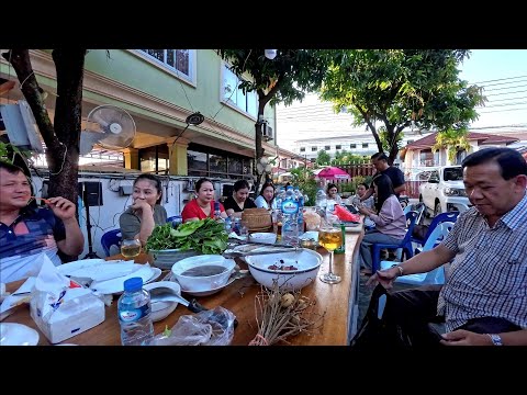 Cousins visiting Laos, have a family get together 