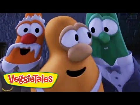 Three animated vegetables in tuxedos posing together, VeggieTales logo in the bottom-left corner.