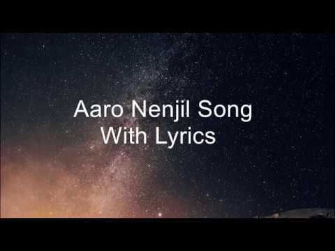 download lagu mp3 mp4 Aaro Nenjil Lyrics, download lagu Aaro Nenjil Lyrics gratis, unduh video klip Aaro Nenjil Lyrics