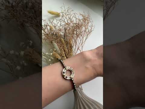 Серебряный браслет с фианитами и золотом