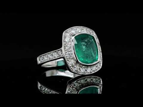 Emerald Halo Diamond Ring in 18k Gold - Orogem Jewelers