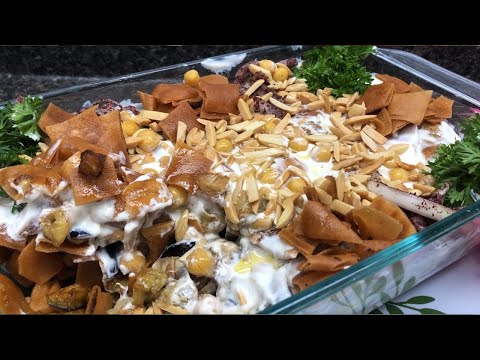Fatteh hummus with eggplant - chickpeas with pita bread and yogurt -fatteh homos