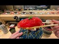 Eating At A Conveyor Belt Sushi Restaurant In Osaka