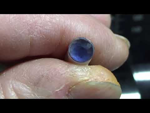 FACETING A MULIT FACET ROUND BRILLIANT WITH BEAUTIFUL BLUE IOLITE