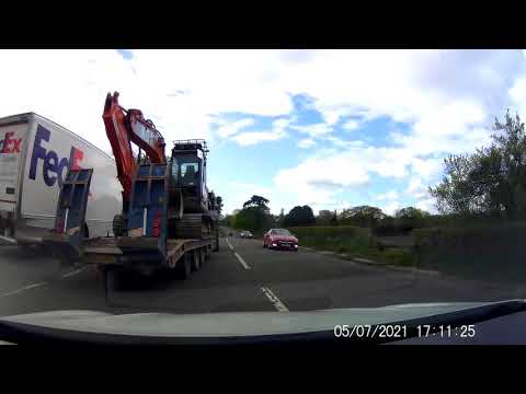 Driver Pulls Emergency Stop Attempting to Overtake a Tractor on a Blind Hill