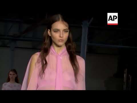 Italian designer Alessandro Dell'Acqua celebrates his 21 years in fashion with 21 sheer opening look