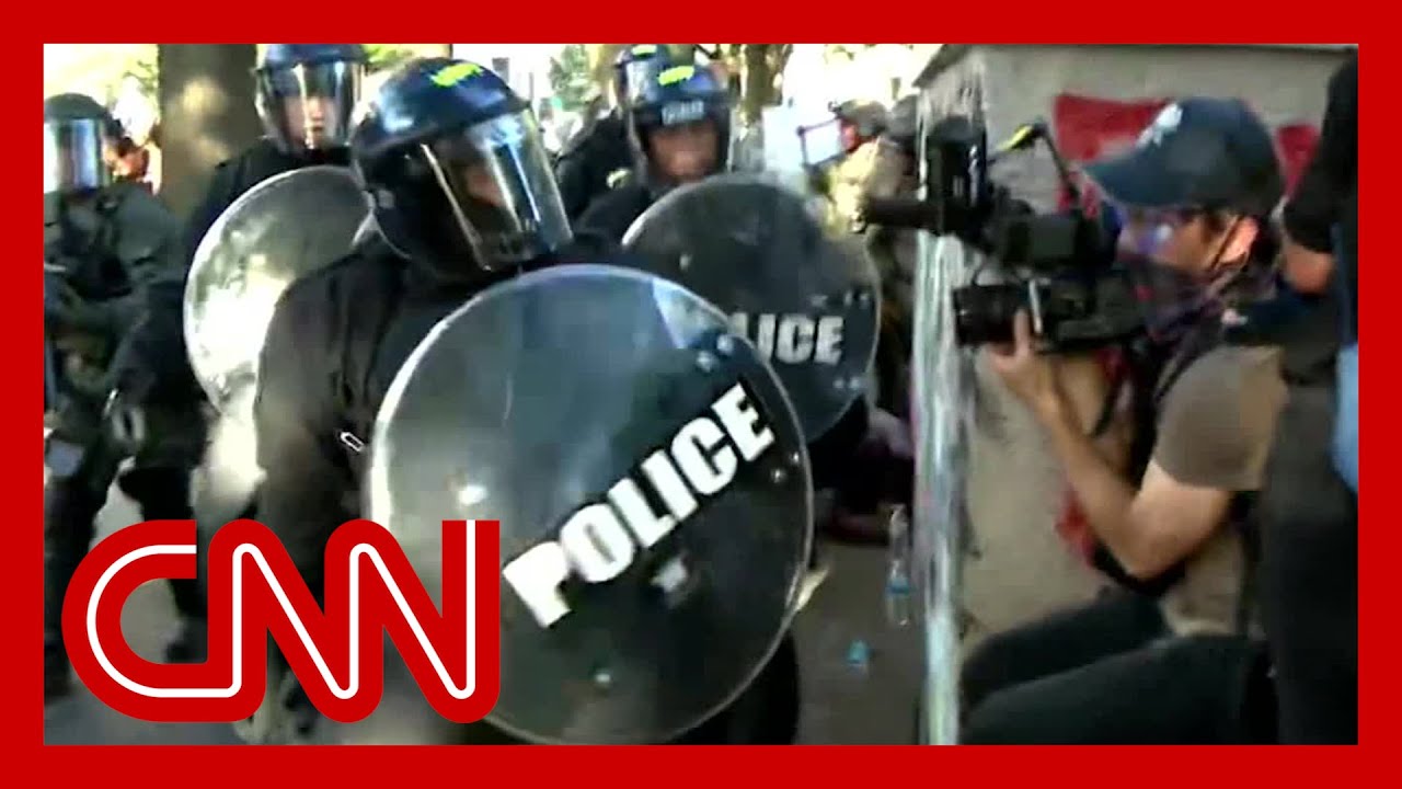 Video shows US police attack Australian journalists