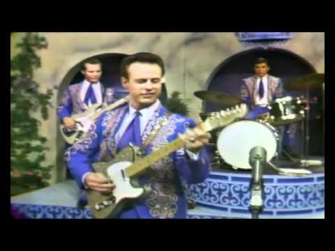 Buck Owens & His Buckaroos  - "I've Got A Tiger By The Tail"