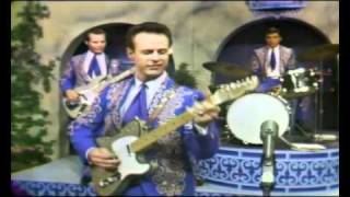Buck Owens & His Buckaroos  - "I've Got A Tiger By The Tail"