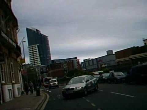 Taxi cuts across road and drives directly at cyclist at The Hard, Portsmouth