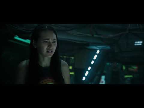 Underwater official trailer frame — Norah (Kristen Stewart) in flooded corridors as sonar pings and low brass swell