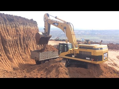 Caterpillar 365C Excavator Loading Trucks