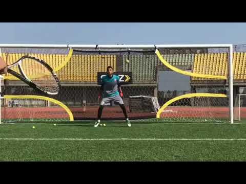 Goalkeeping practice with tennis balls and rackets