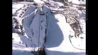 preview picture of video 'Snowmobile hillclimbing, the worlds largest skiflying hill in Vikersund'