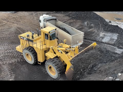 Huge Caterpillar 992C Wheel Loader Loading Coal On Trucks With Two Passes - S.G.M Melidis