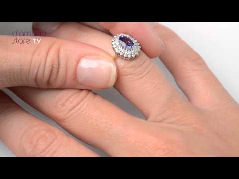 A4425 - Tanzanite 7 x 5mm And Diamond 9K Gold Ring