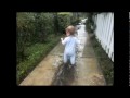 Cute Baby Splashing In Puddles