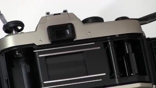 Intro Photo: Unloading Film from a Nikon FM10 Manual Camera