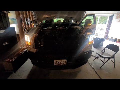 2023 Ford F-250 grill and headlight removal for easy bulb change.