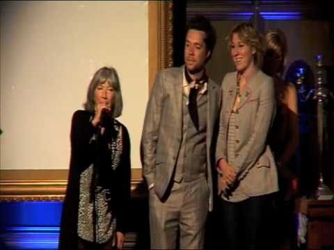 The MOJO Roots Award presented to Kate and Anna McGarrigle by Emmylou Harris