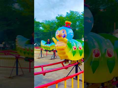 😬🐛 Fear level up! This young man only dares to ride the rear carriage of the caterpillar train.