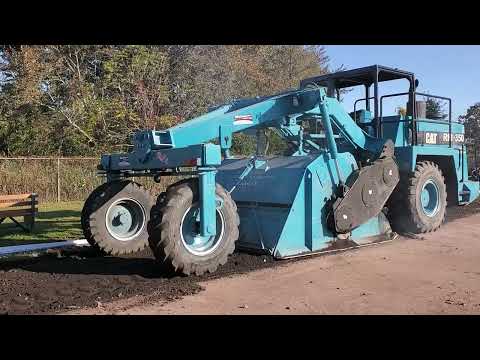 Cat 350 grinding tennis courts in CT