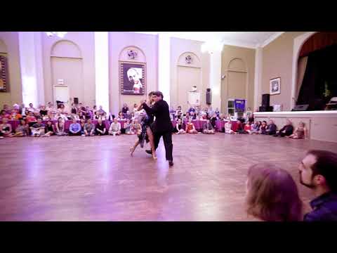  Alejandra Hobert  and  Adrian Veredice  are  dancing  to  the  vals  "  Flor de Lino  "  by  Solo Tango Orquesta  at  Philly Tango Fest  in  2019