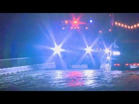 DFW ICE STORM: Sand truck gets stuck uphill, slides backward