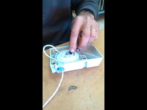 armado del mecanismo de arranque STIHL