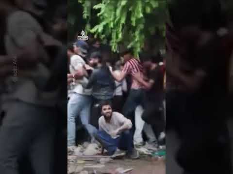 Indian police beat ‘Cockroach’ march protesters