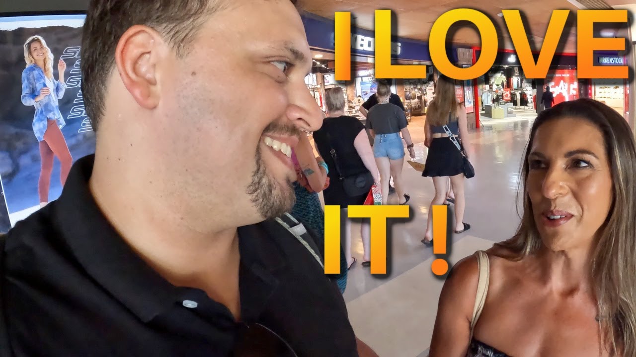 A traveler explores Beachwalk Shopping Center in this video.