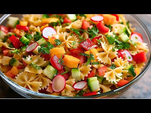 This colorful pasta salad with oil and mustard dressing without majo is super tasty
