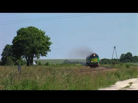 Freight trains with ST44 class locos at 1435mm track at Roztocze region.