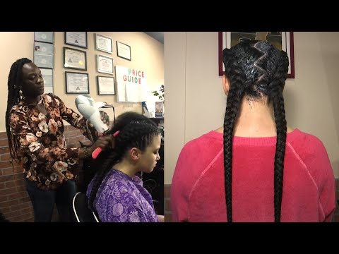 African Hair Braiding salon offers customers authentic...