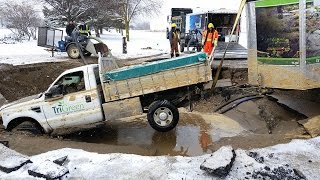 Sinkhole swallows pickup truck