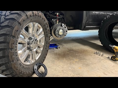 GMC Denali 2500 Stock wheels with 3/8 Hub Centric Bora spacers and 13.50 MT Tires