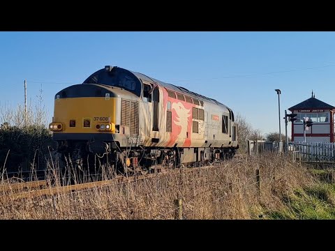 Europhoenix 37608 'Andromeda' at Langham level crossing