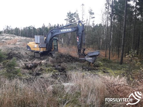 Mechanised forest planting - Volvo excavator with Bracke P11a