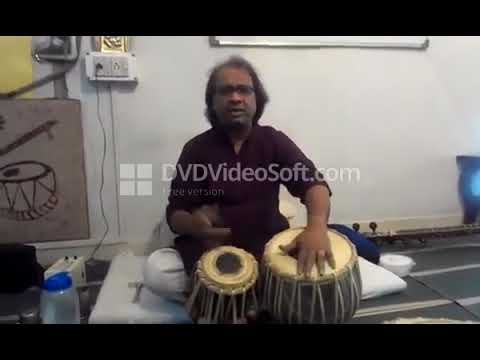 Pandit Nayan Ghosh reciting Bol while playing Theka on Tabla   I