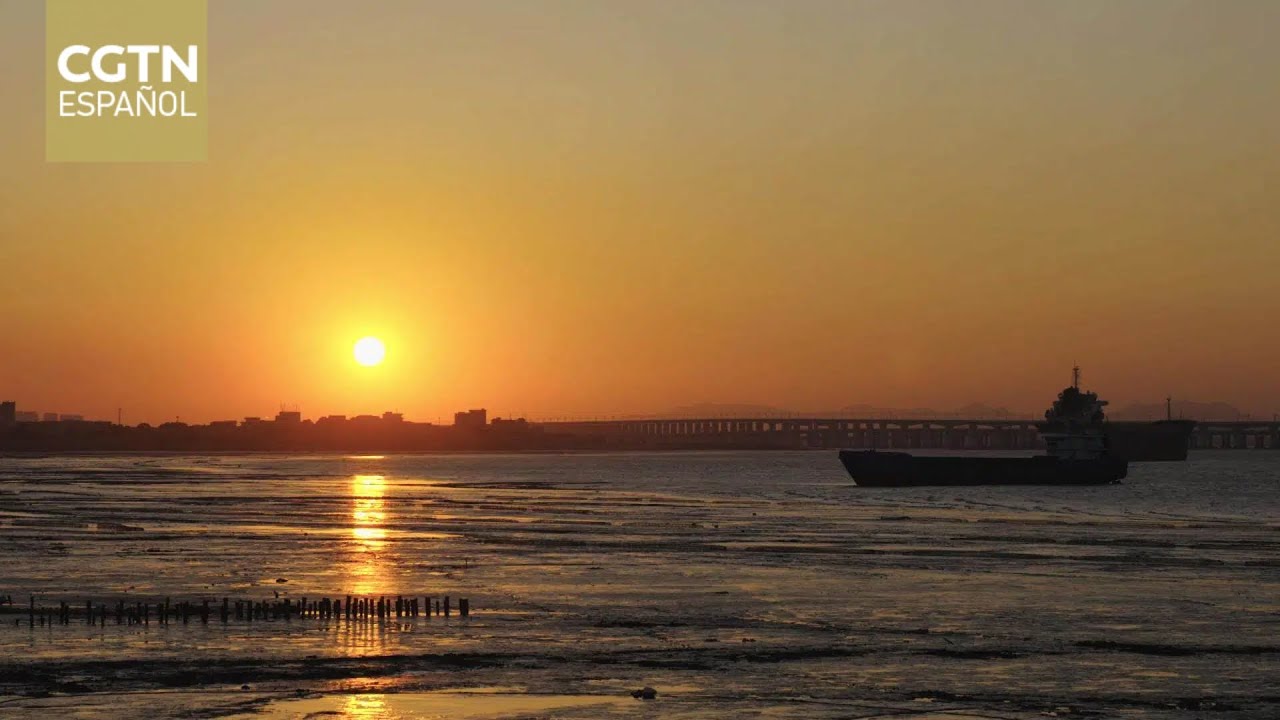 La puesta de sol sobre el mar en Linluandu, Quanzhou